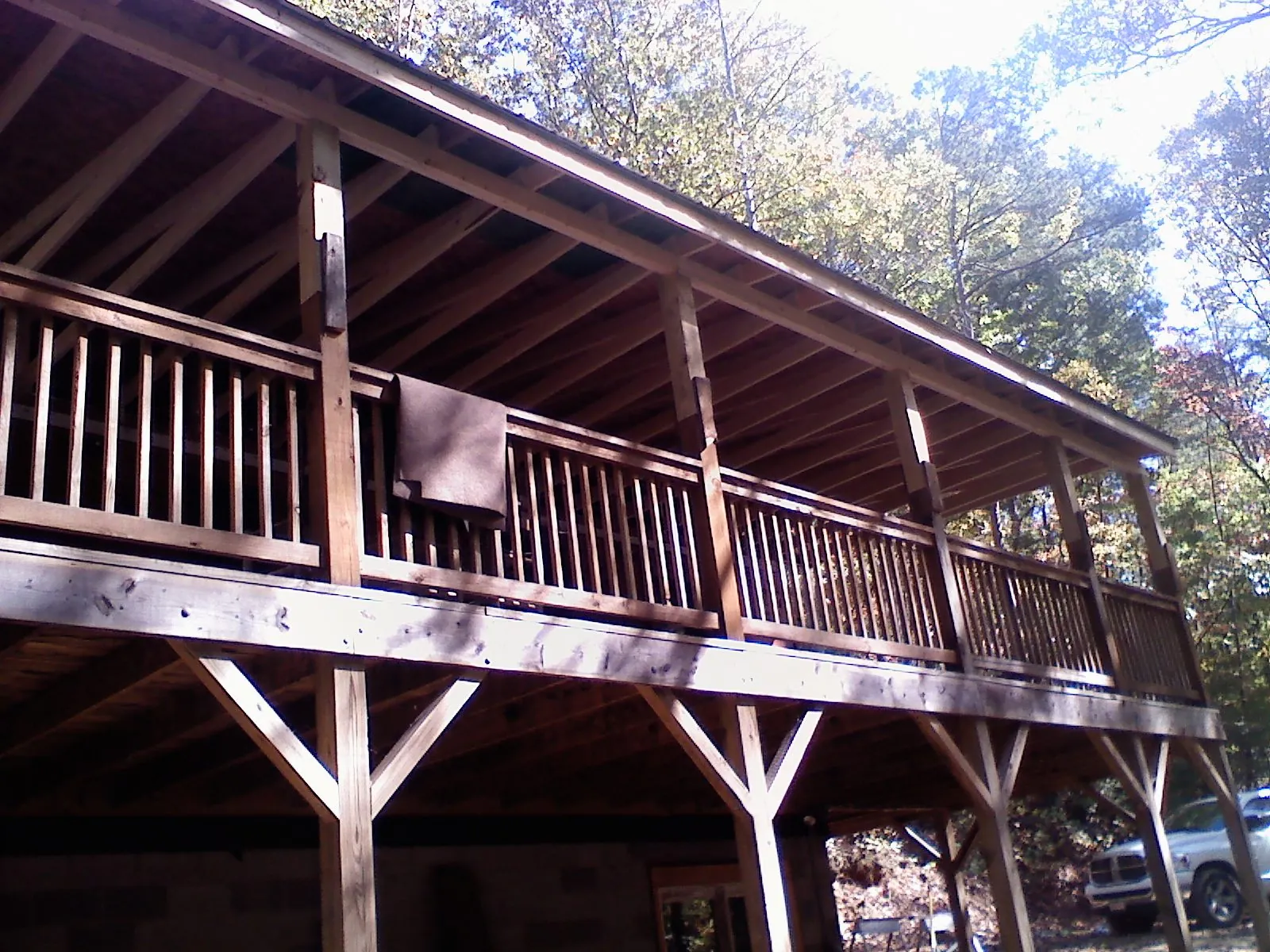 Timber framing under a new elevated porch and deck — Roof Leak Repair in South Berwick by Roofing Brothers
